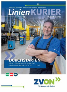 Arbeiter in der Werkstatt mit Zug